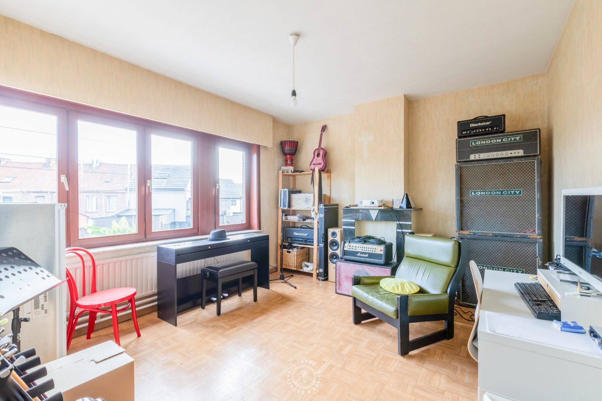 Ruime gezinswoning met fijne tuin en mogelijkheid tot vijf slaapkamers foto 19