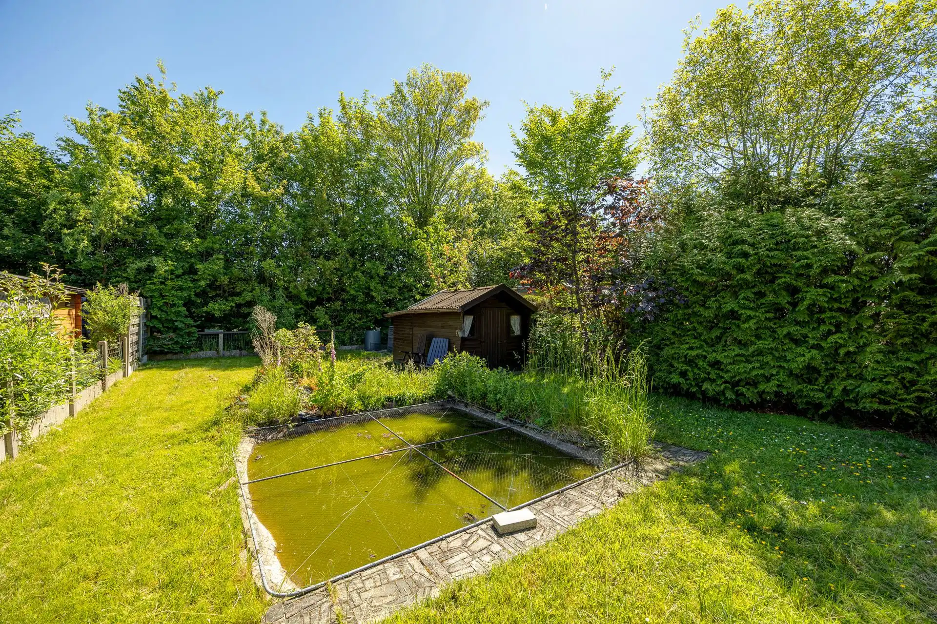 Ruime halfopen bebouwing met garage en zonnige tuin foto 4