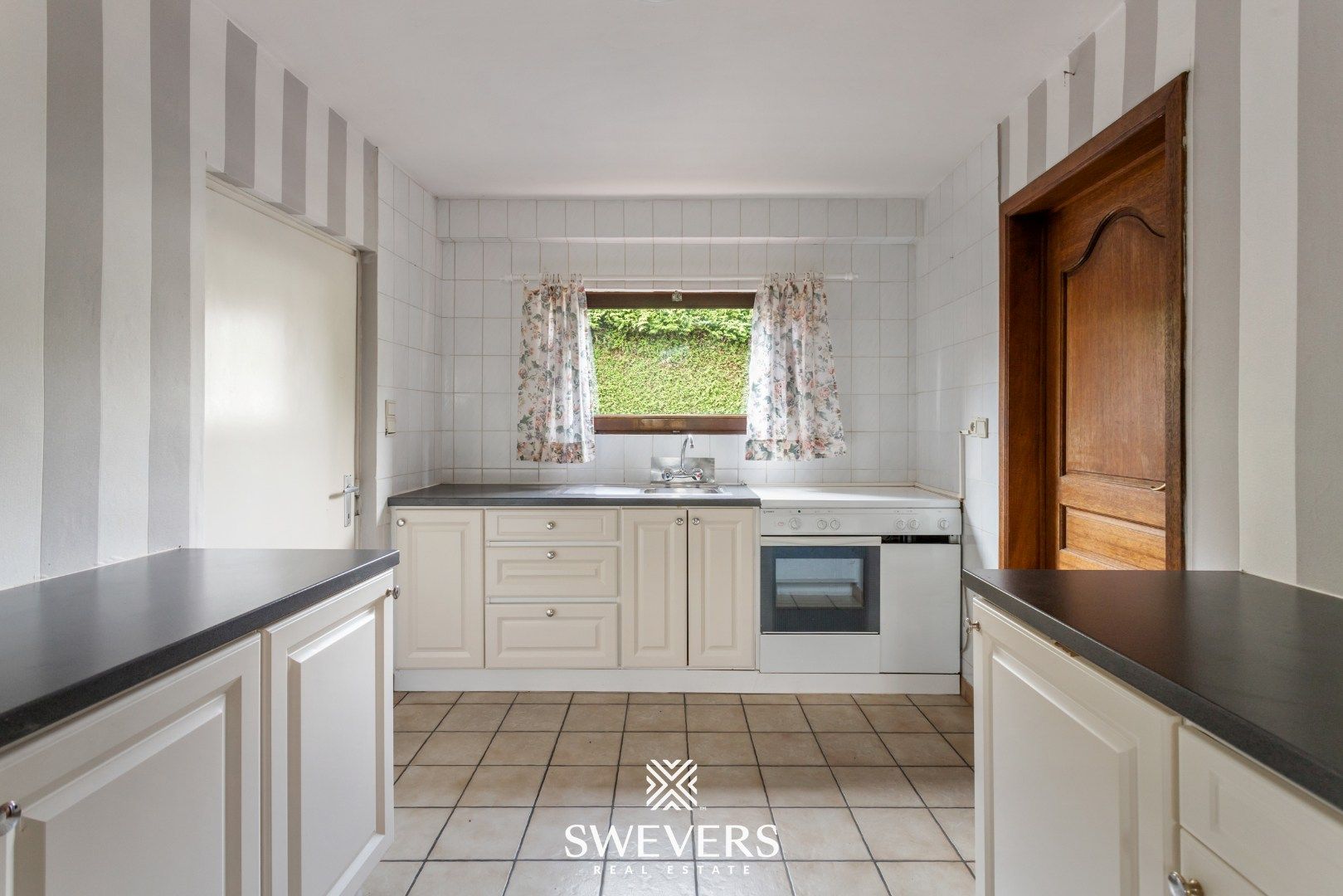 Te renoveren woning met veel potentieel op toplocatie te Diepenbeek foto 7