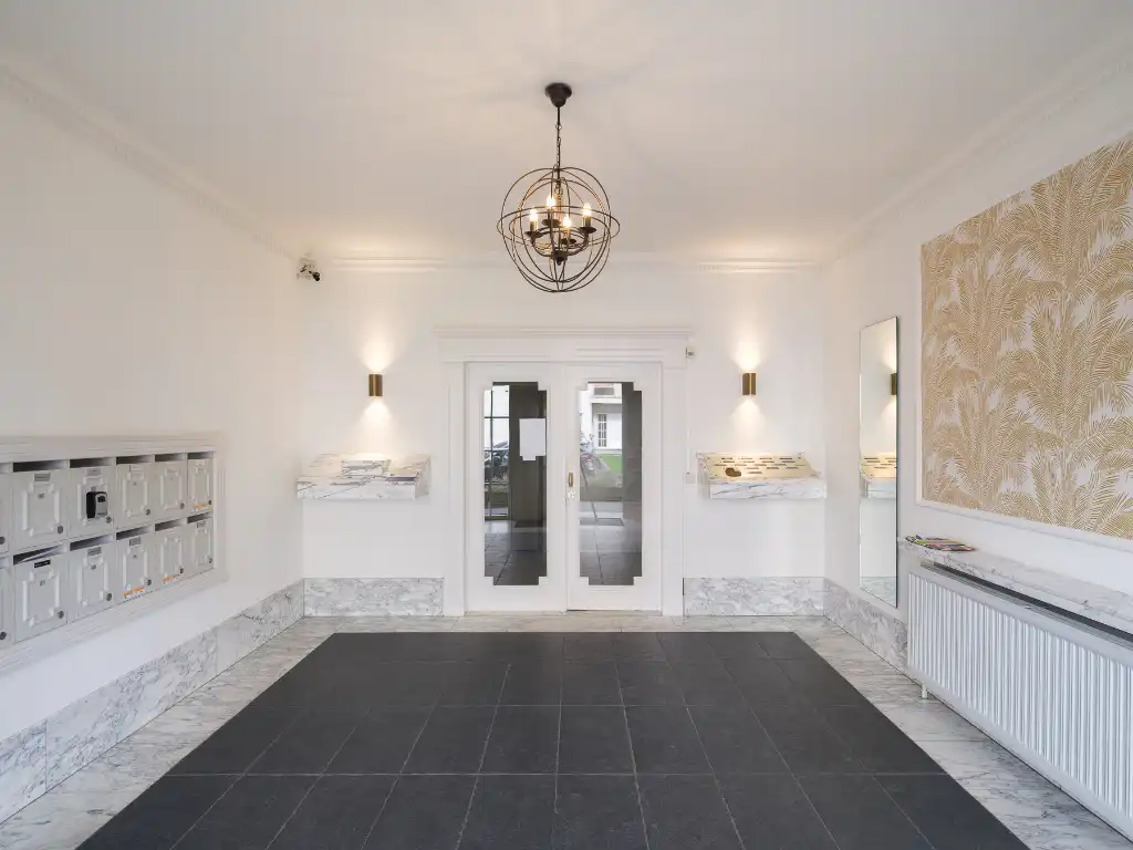 Hoekappartement met veel potentieel in residentie ‘Carlton’ nabij Gent foto 16