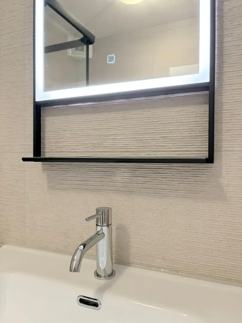 Netjes gerenoveerd 1-slaapkamer appartement met ruime kelder en inpandige garage foto 21