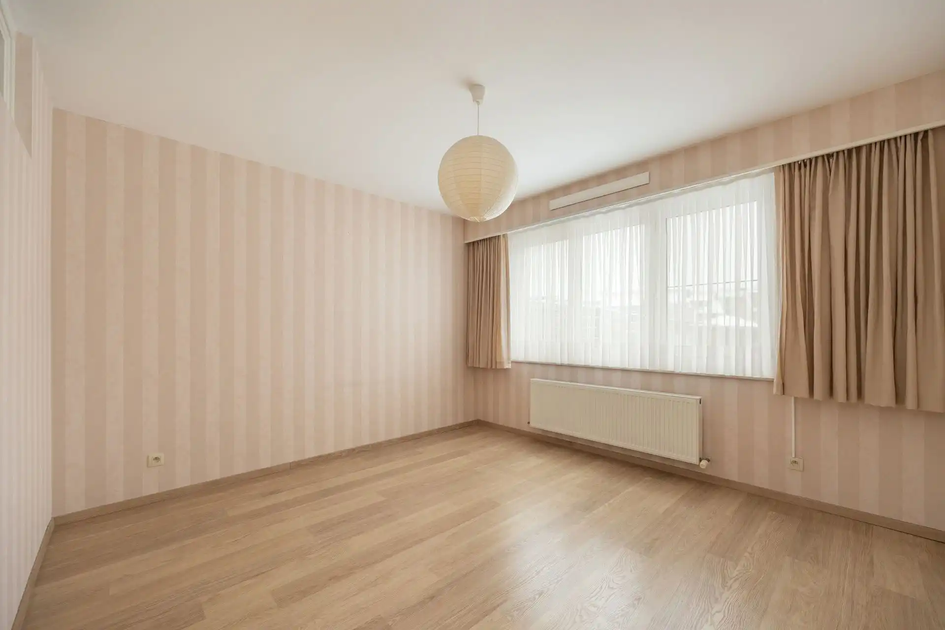 Gelijkvloersappartement met grote tuin & garage foto 21