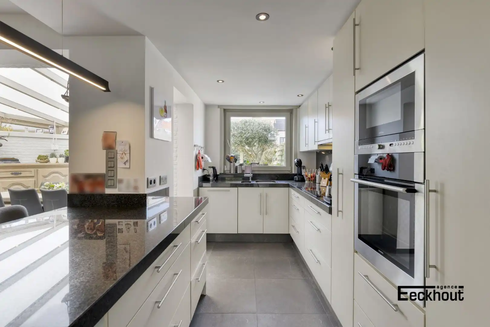 Instapklare woning met handelsruimte en met zonnige tuin! foto 7