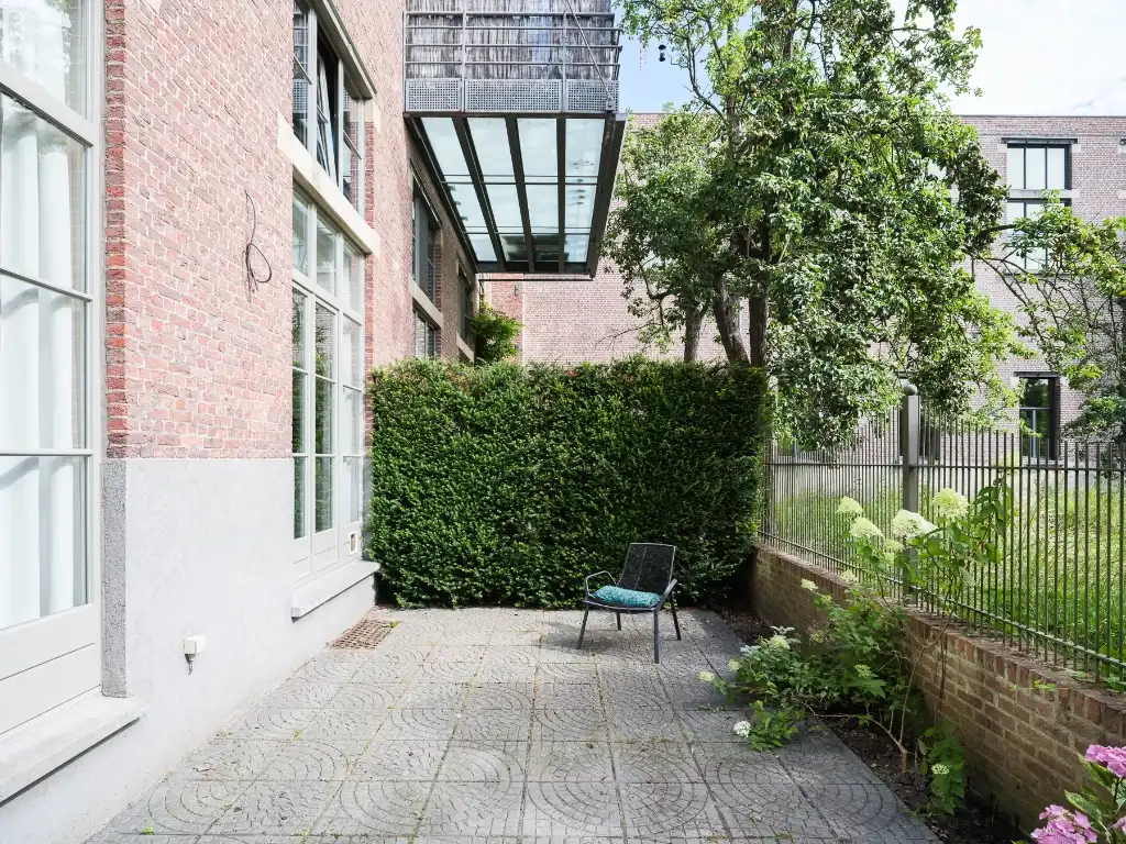 Ruime loft met industrieel karakter en twee terrassen, gelegen op de tweede bouwlijn aan de Lousbergskaai. foto 7