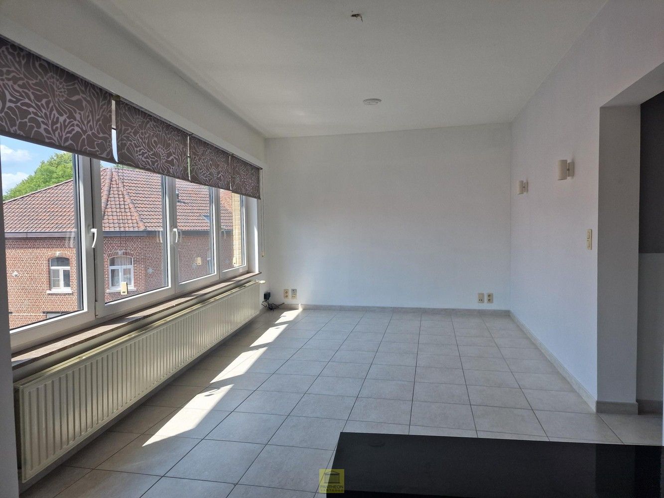 Interessant opbrengsteigendom met 3 appartementen in het hart van Vlezenbeek foto 2