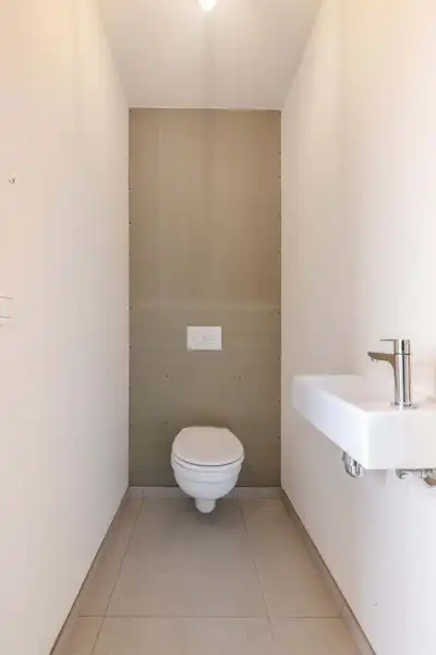 Prachtige, verrassend ruime nieuwbouwwoning met 3 slaapkamers én inpandige garage te koop in Dentergem! foto 3