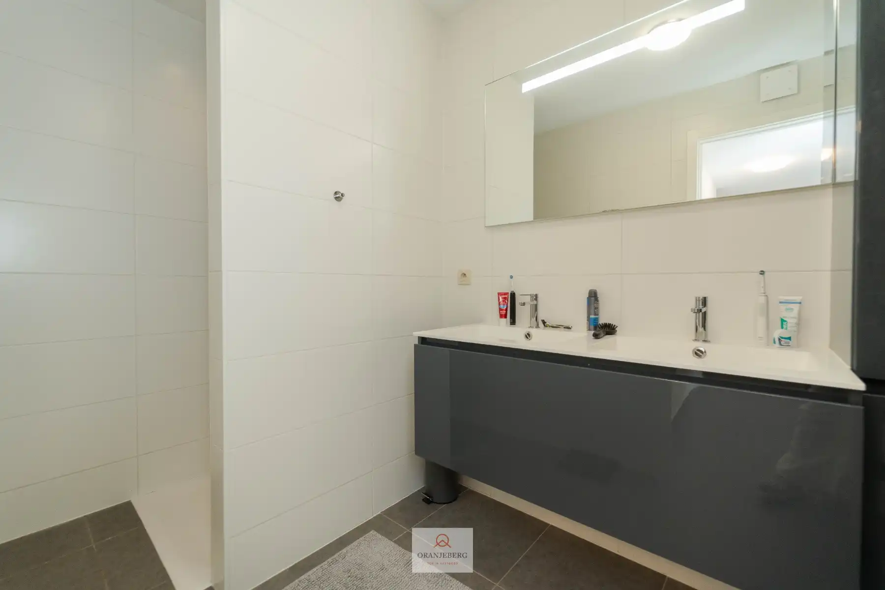 Gelijkvloers 2 slaapkamerappartement met ruime tuin foto 19
