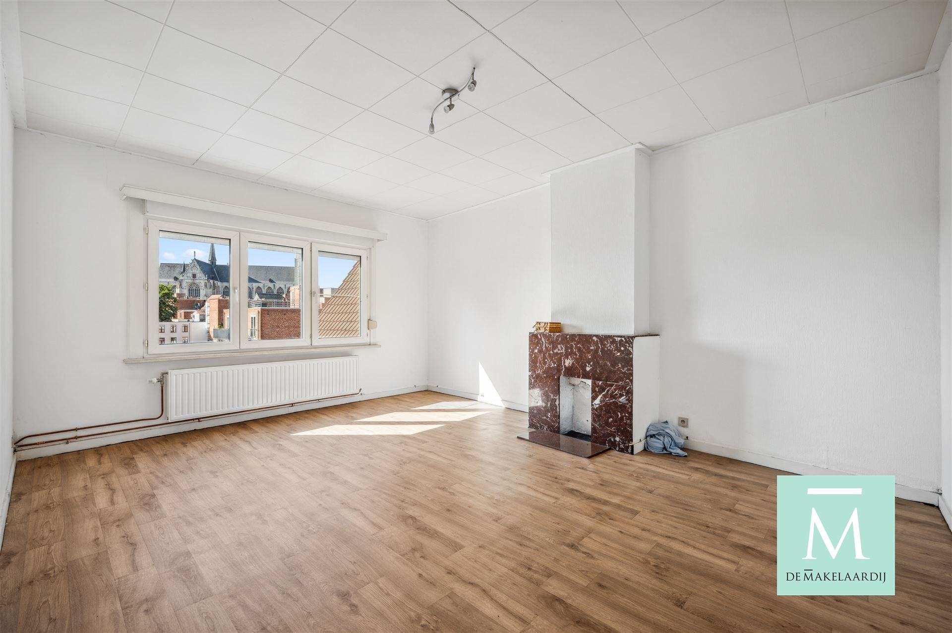 Appartementsgebouw met handelspand op het gelijkvloers foto 11