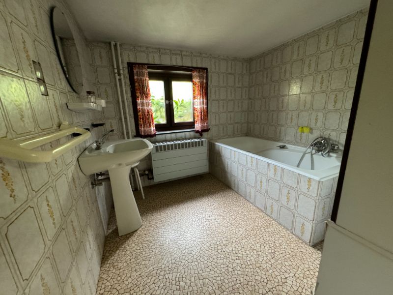 Te renoveren langgevelwoning met veel potentieel op ruim perceel in Herselt foto 14