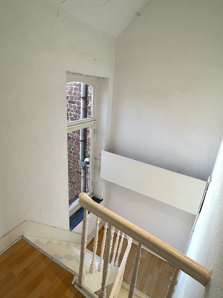 Charmante, te renoveren, stadswoning op topligging in hartje Leuven foto 13