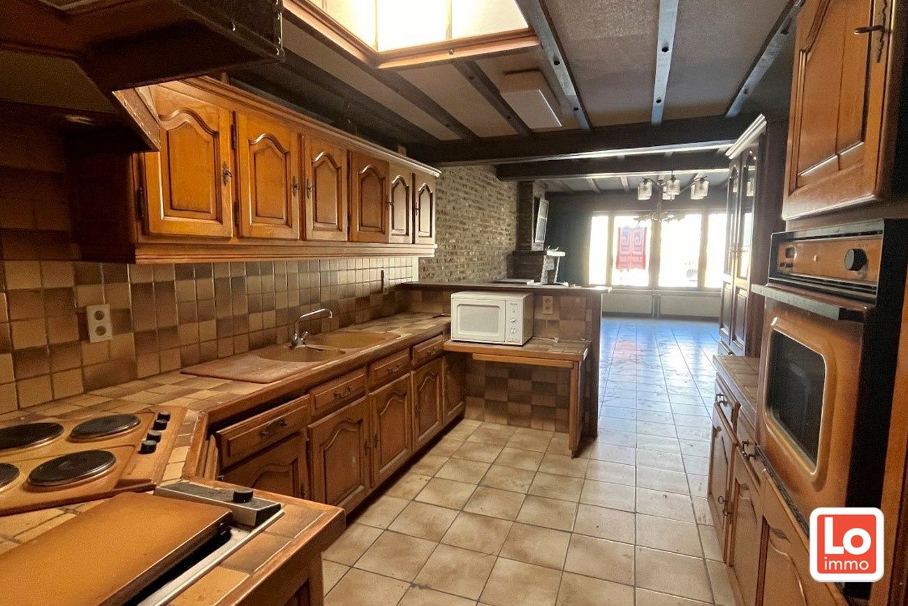 Te renoveren woning met 3 slaapkamer en tuin op een topligging in Centrum Lochristi foto 8