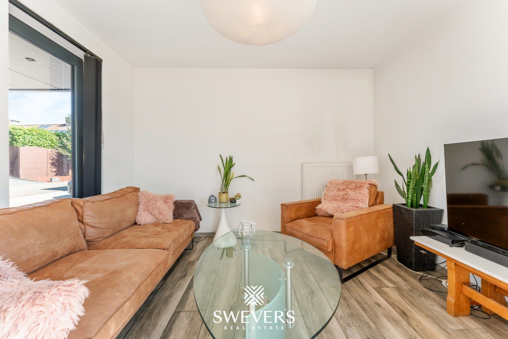 Recente, instapklare en energiezuinige woning op rustige straat te Kortessem foto 4