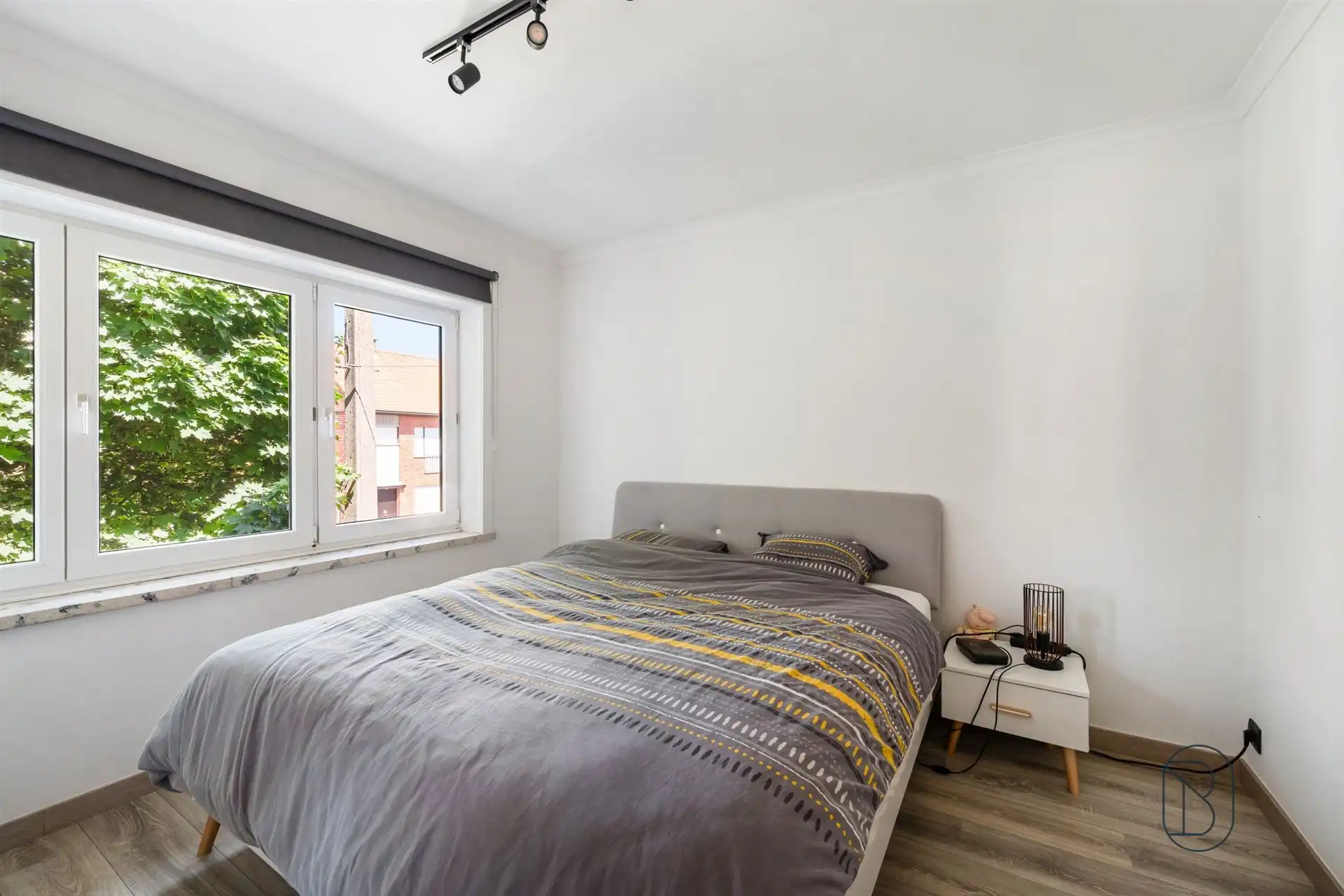 Instapklare woning met zonnige tuin, garage & tweede uitweg foto 9