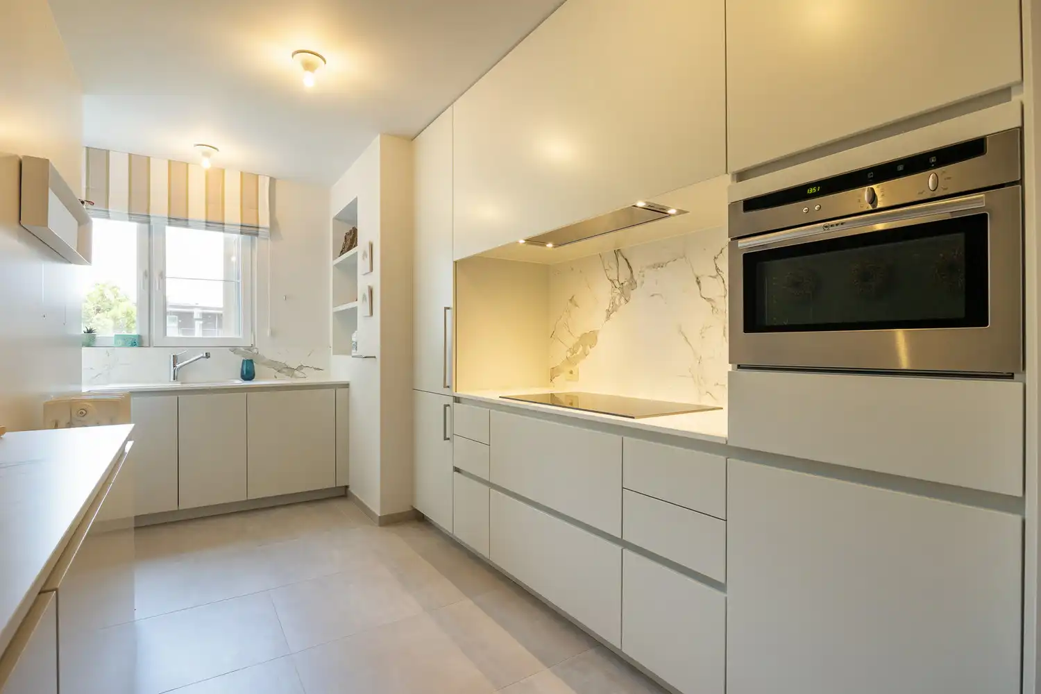 Energiezuinig (EPC B) en hoogwaardig gerenoveerd art-decoappartement met 2 slaapkamers, terras en gelijkvloerse polyvalente ruimte op absolute toplocatie aan ’t Groen Kwartier foto 21