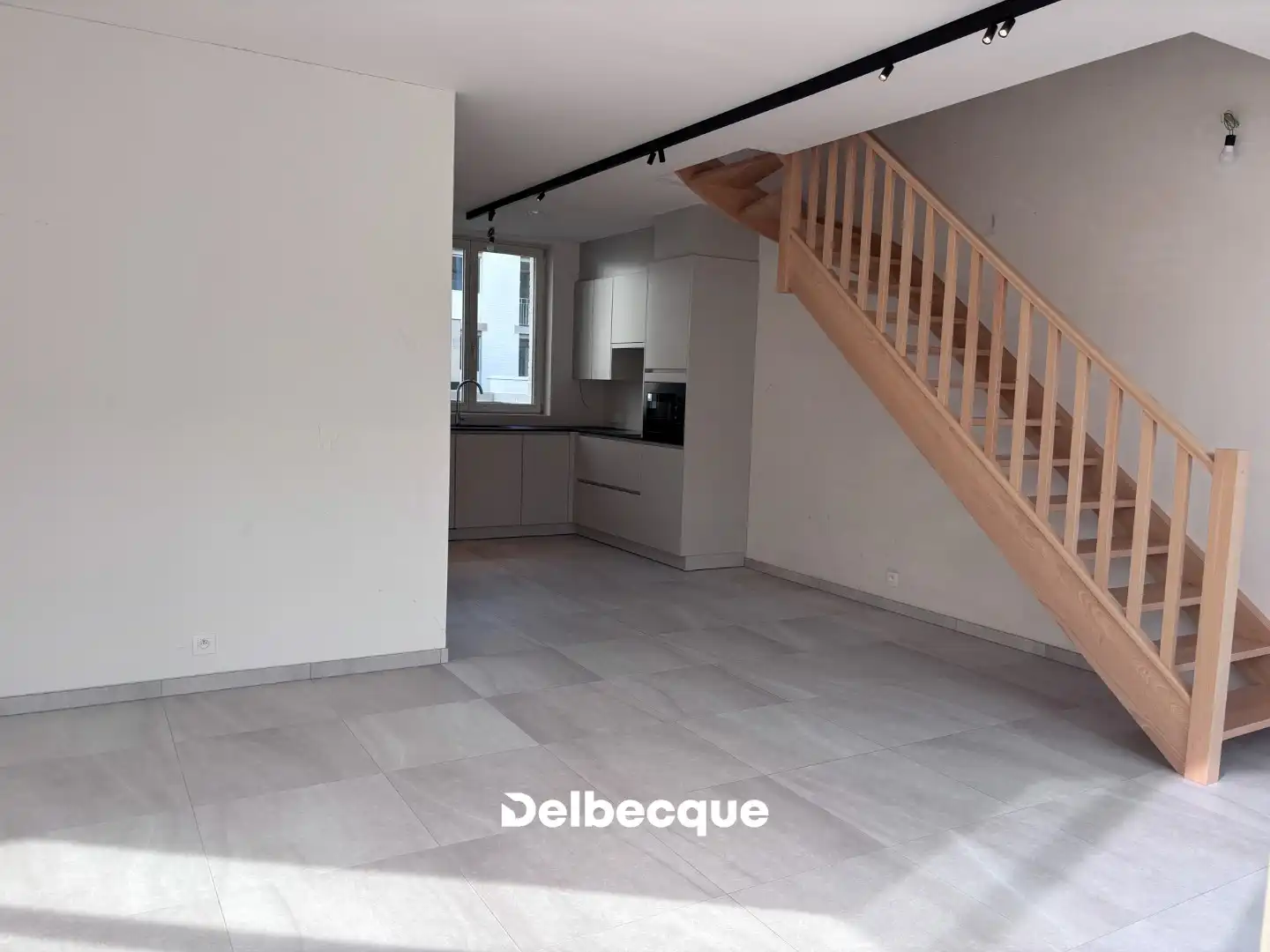 Lichtrijke nieuwbouwwoning met 3 slaapkamers, tuin en ondergrondse staanplaats foto 4