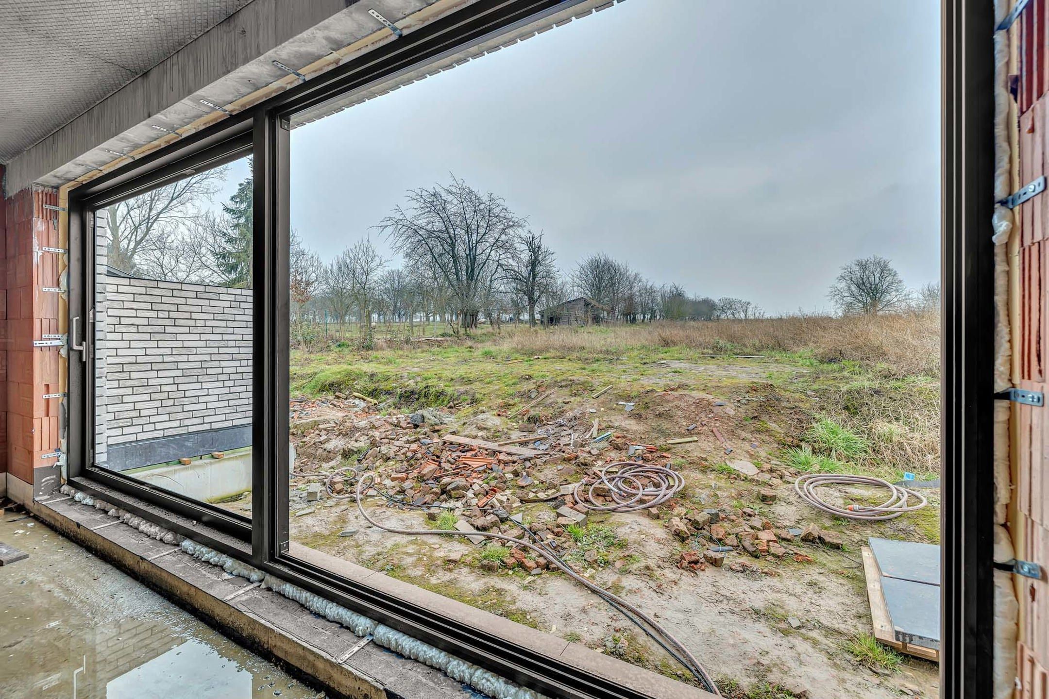 Halfopen nieuwbouwwoning op een prachtig perceel foto 10