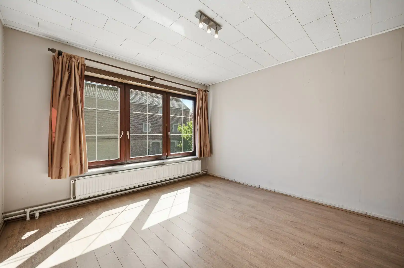 1 rijwoning en 2 appartementen in gezellig Hoegaarden foto 16