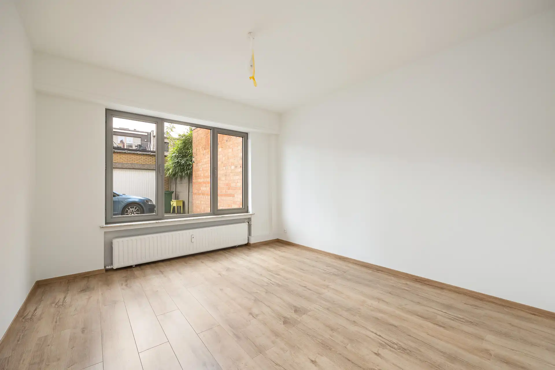 Instapklaars gelijkvloersapp met 2 slaapkamers + garagebox foto 8