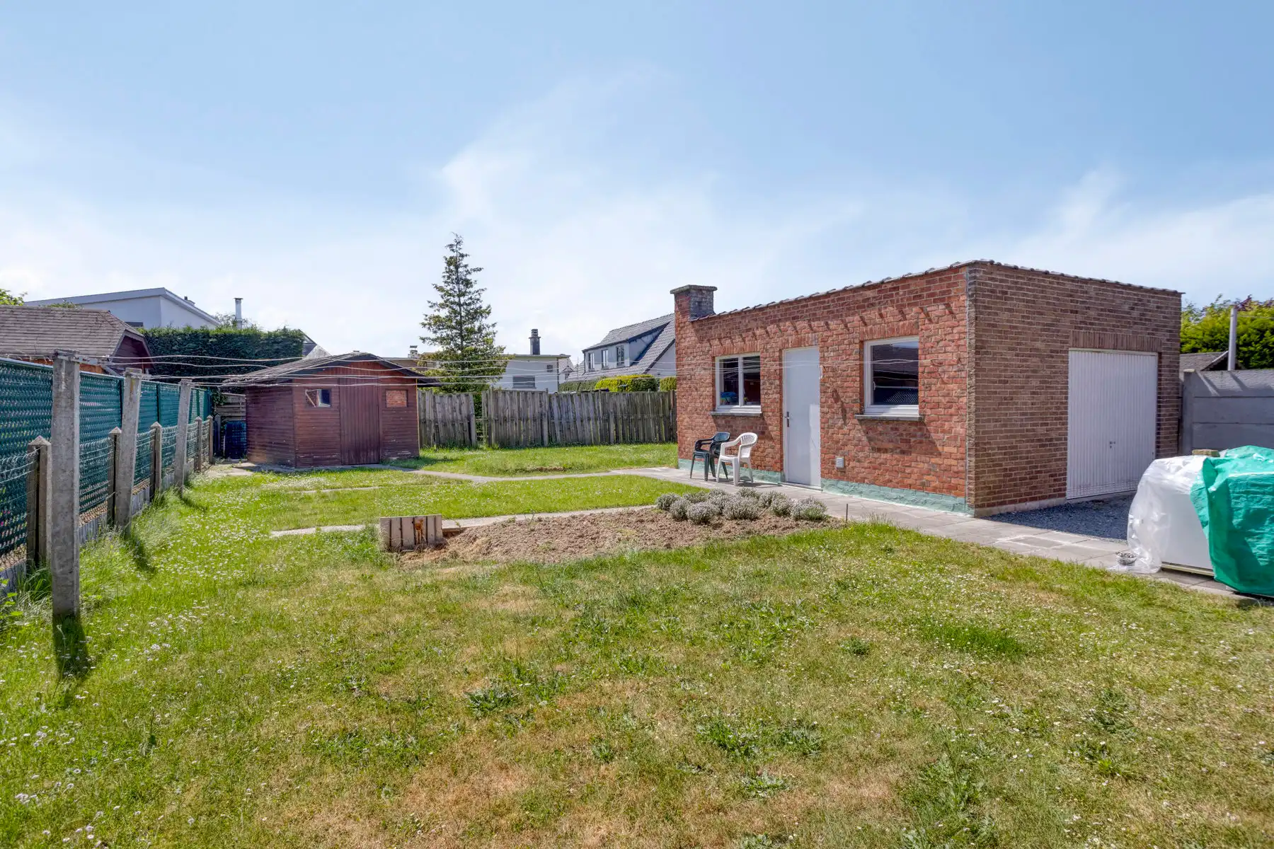 Te renoveren open bebouwing met zuidgerichte tuin foto 9