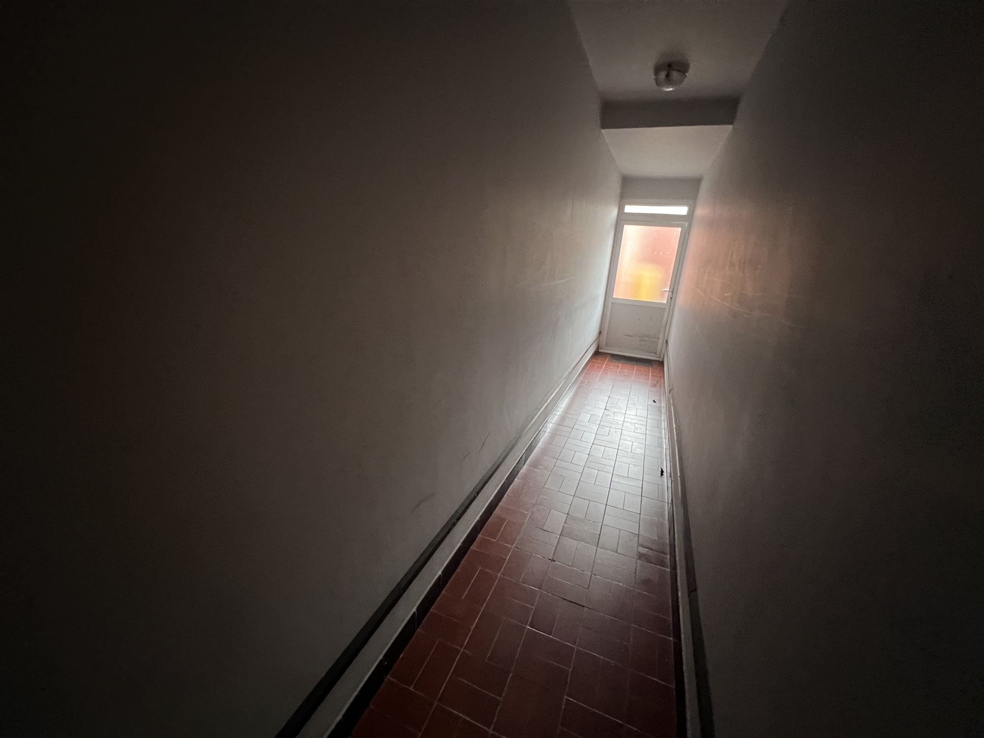 Opbrengsteigendom met 4 appartementen en tuin foto 14