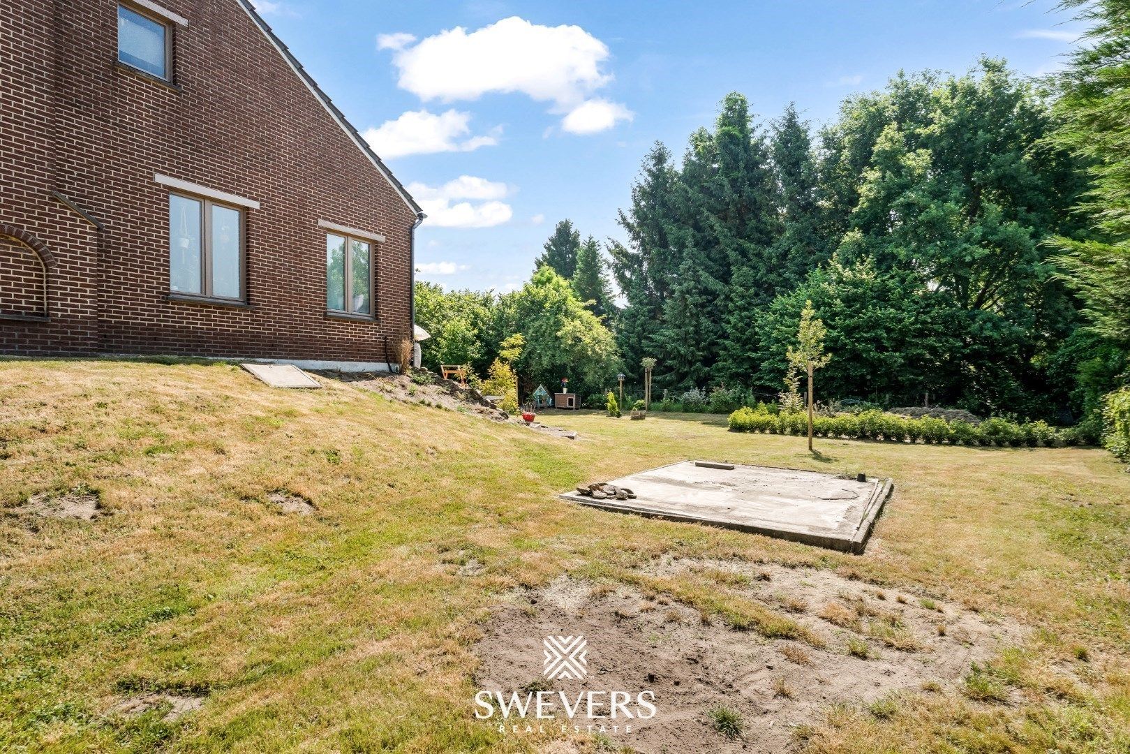 Ruime gezinswoning met zonnepanelen, kelder en zonnige tuin op topligging foto 31