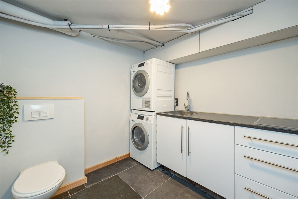 Gelijkvloers appartement met tuin en garage foto 21
