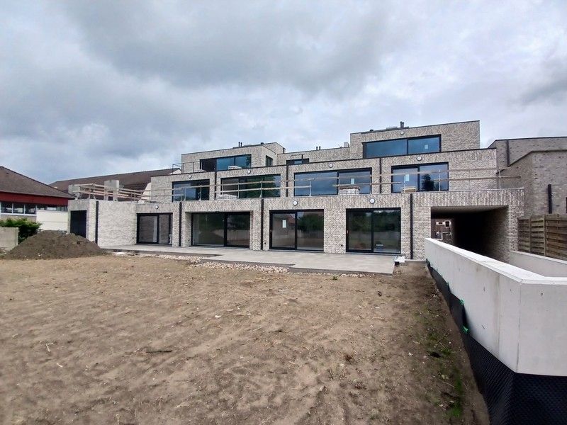 Gelijkvloers nieuwbouw appartement met terras en tuin gelegen in het centrum van Opglabbeek foto 16