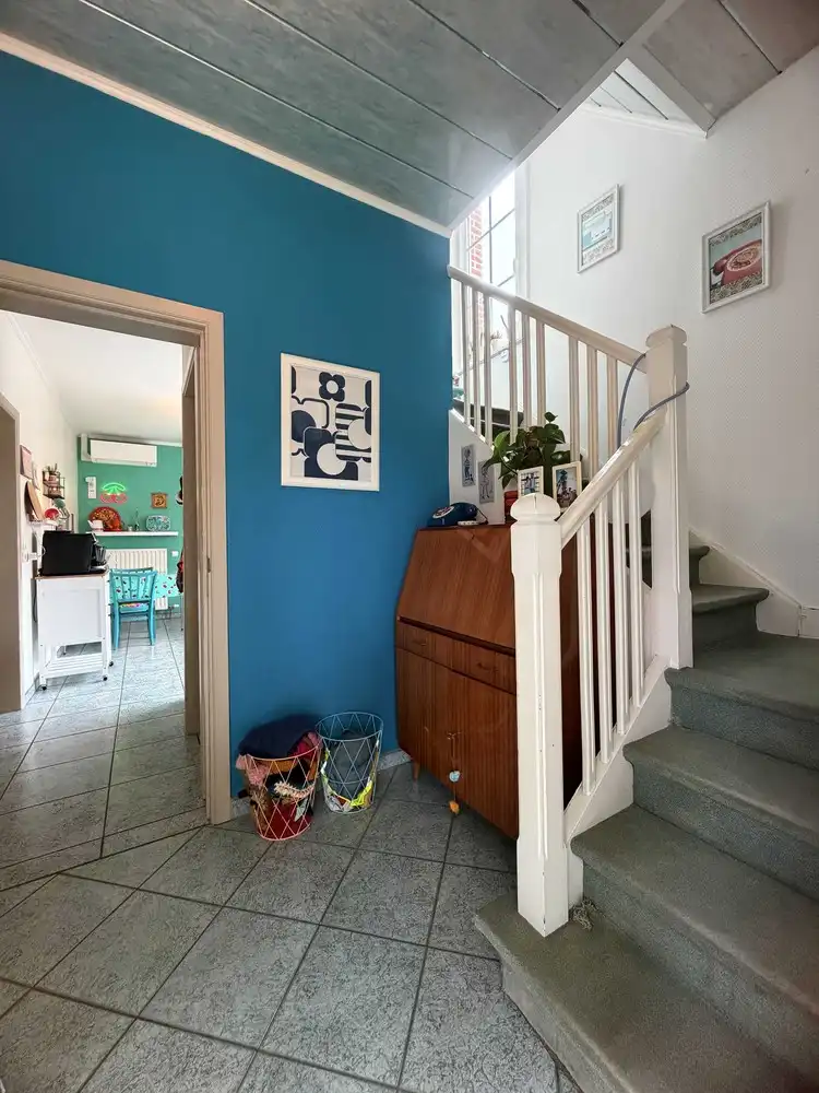 Degelijk gerenoveerde woning met minstens 5 slaapkamers en aangename tuin foto 7