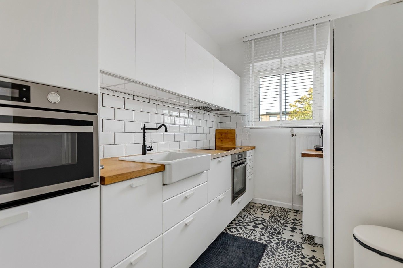 Gerenoveerd app. op 1e verd. met 3 slpk. en garage foto 8