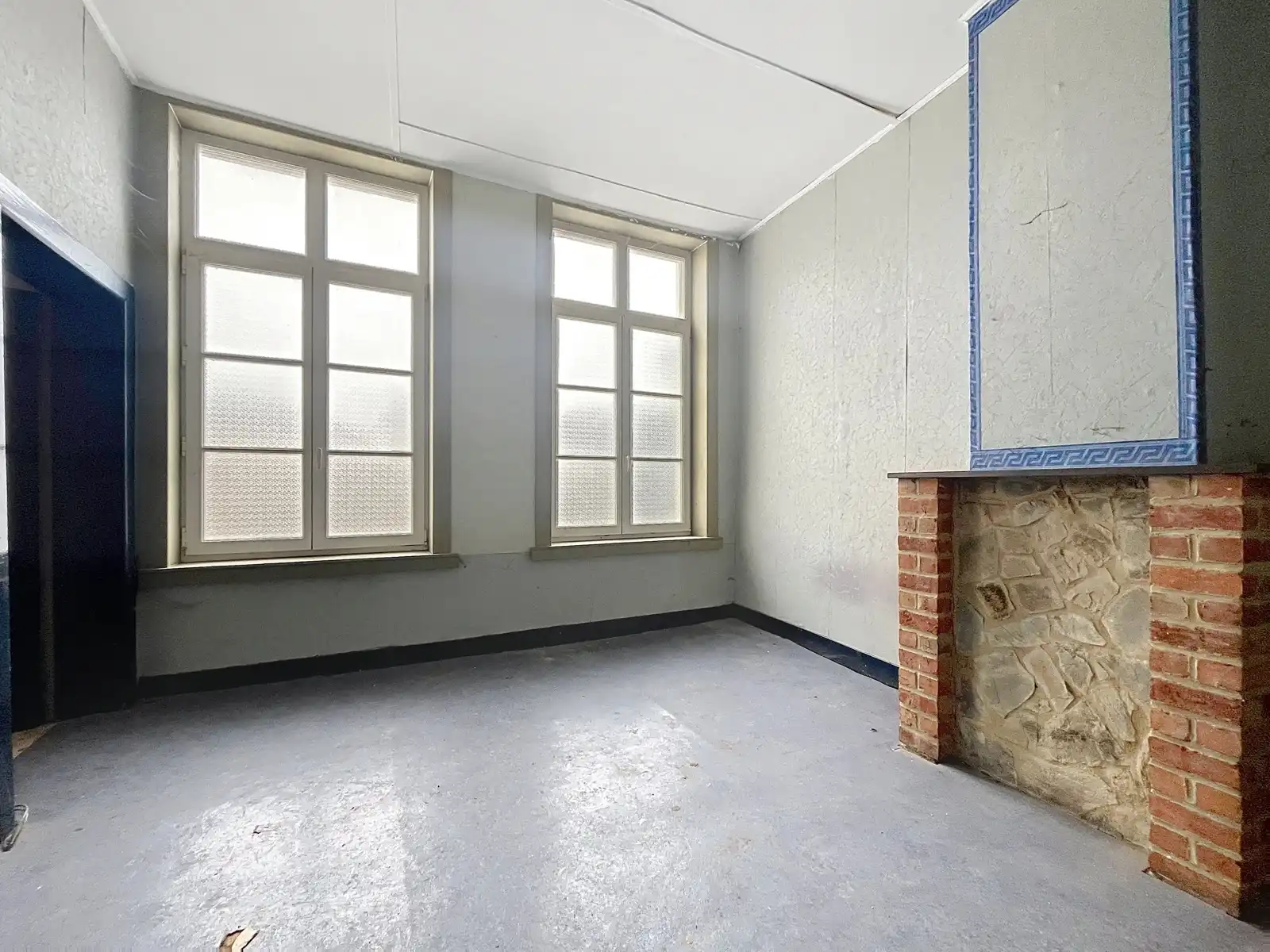 Handelspand met woongelegenheid op de Markt van Tienen foto 9