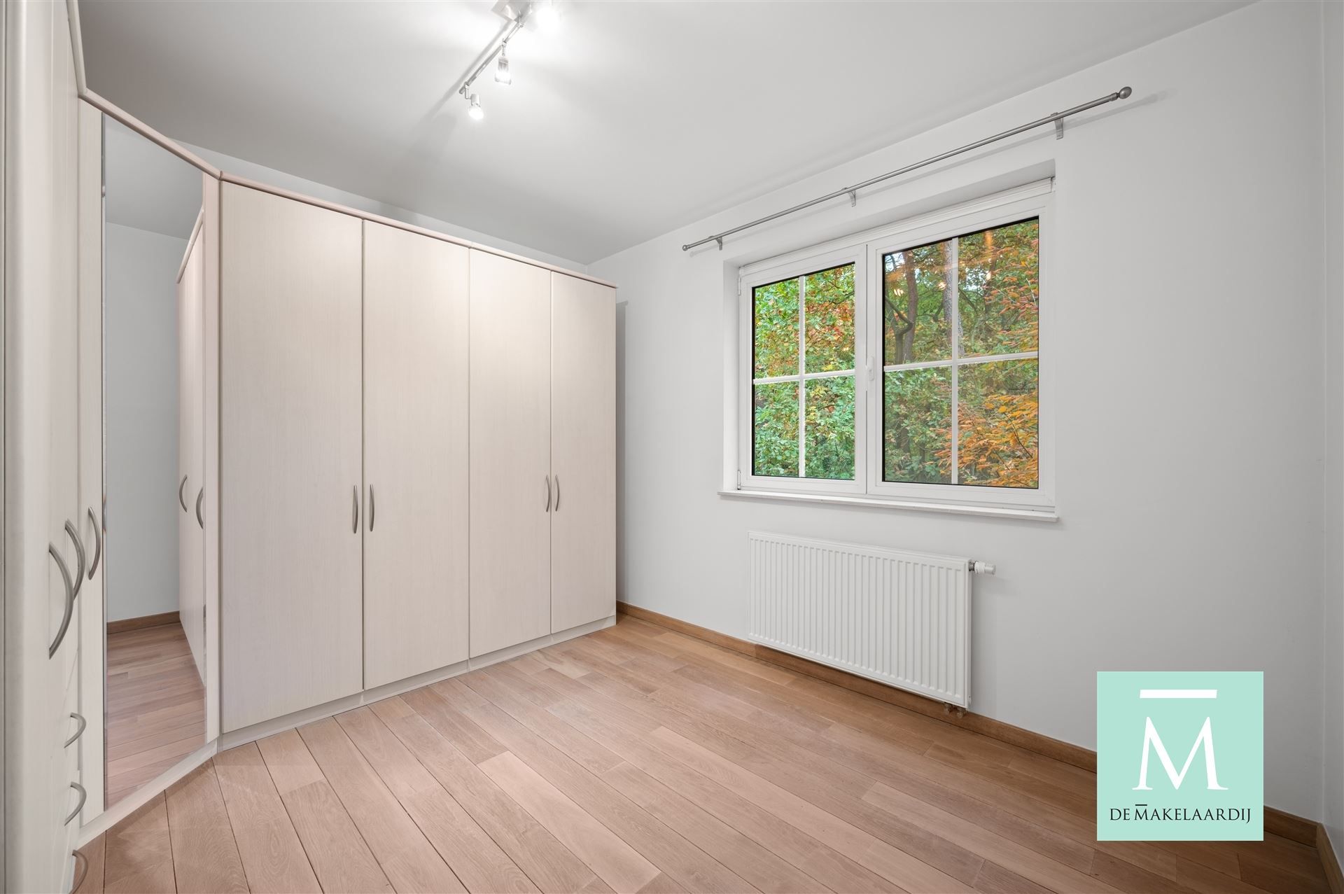 Mooi appartement met autostaanplaats en berging, gelegen in een afgesloten parkdomein foto 10