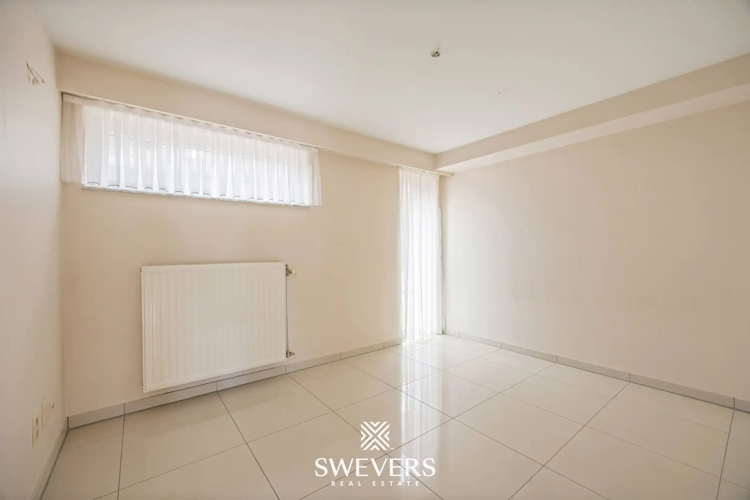 Uitstekend gelegen gelijkvloers appartement met 2 slaapkamers en private tuin foto 17