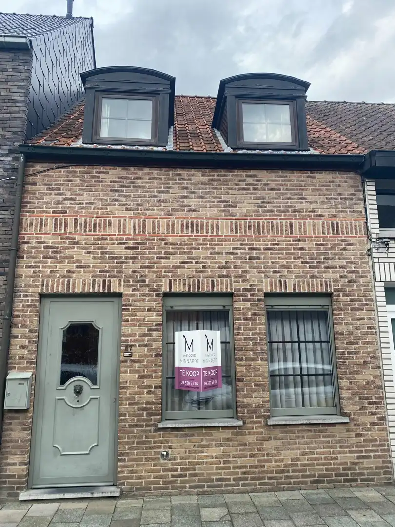 Charmante rijwoning met 2 slpk en koer foto 2