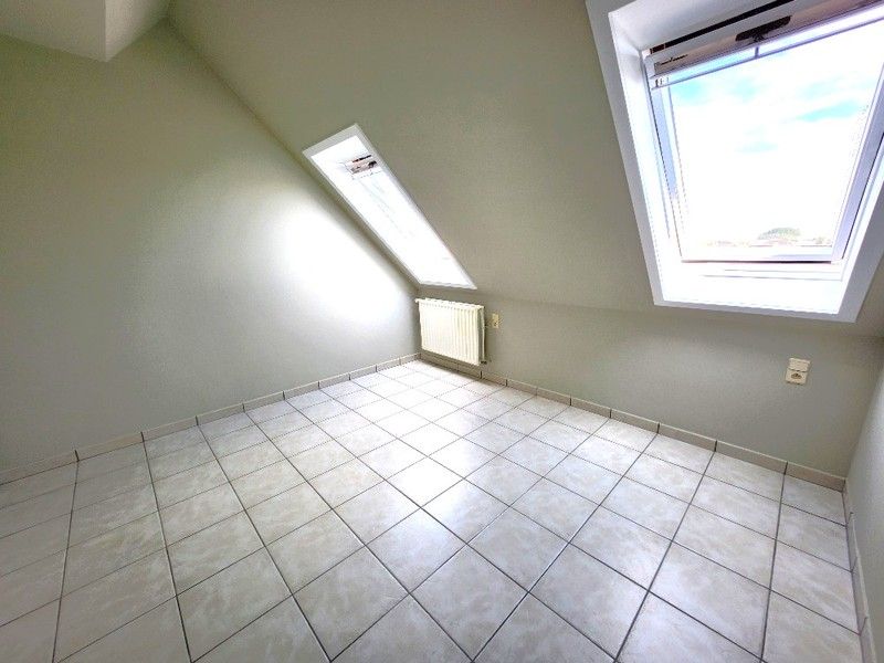 Tweeslaapkamer appartement mét garage in het centrum van Sint-Baafs-Vijve ZONDER SYNDICKOSTEN! foto 6