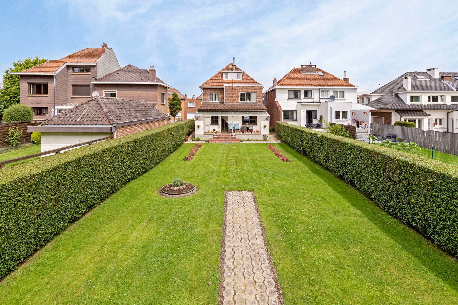 OPTIE Perfect onderhouden woning met 4 slaapkamers en garage foto 2