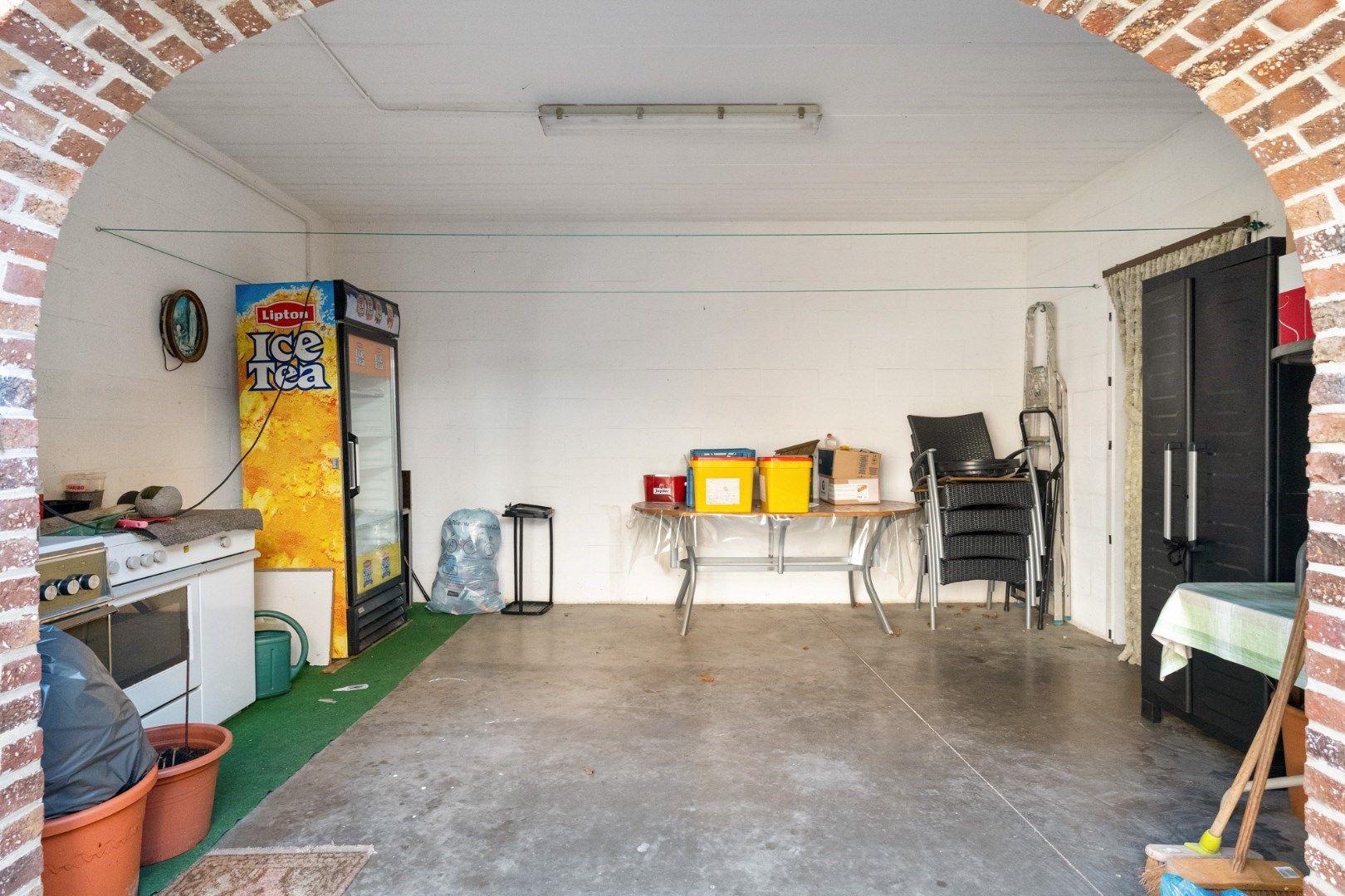 Statige herenwoning met tuin, herbestemd tot meergezinswoning met twee wooneenheden en garages in het centrum van Hoeselt foto 13
