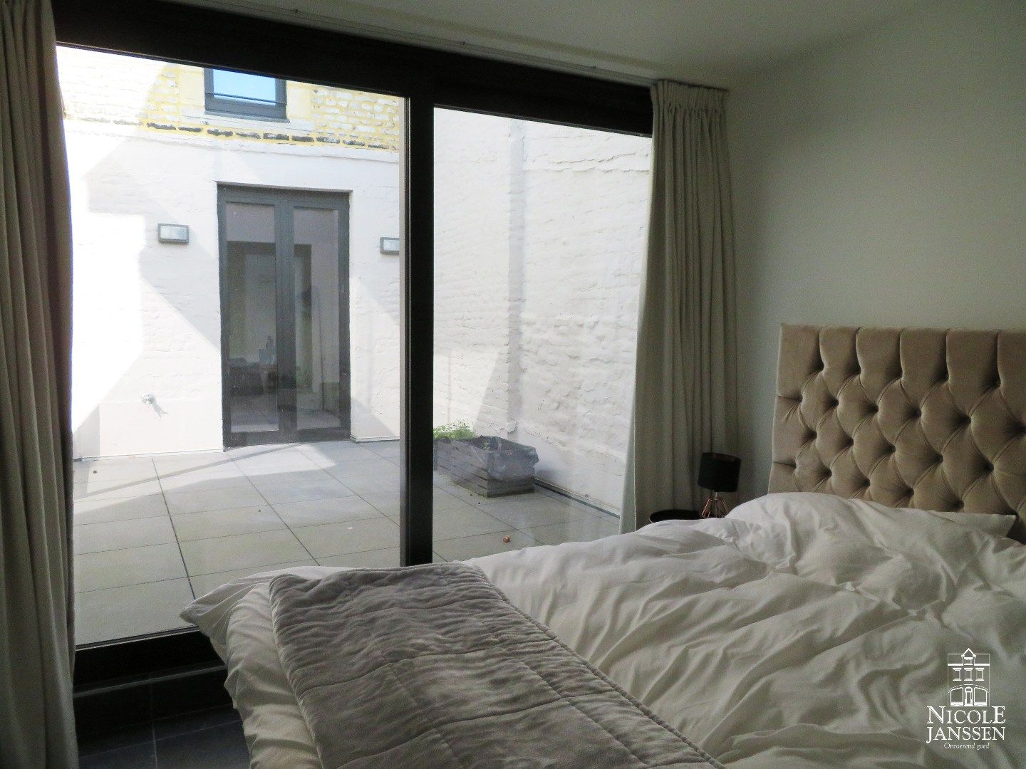 Trendy appartement met gezellig binnenterras en lift in het hartje van Maaseik foto 11