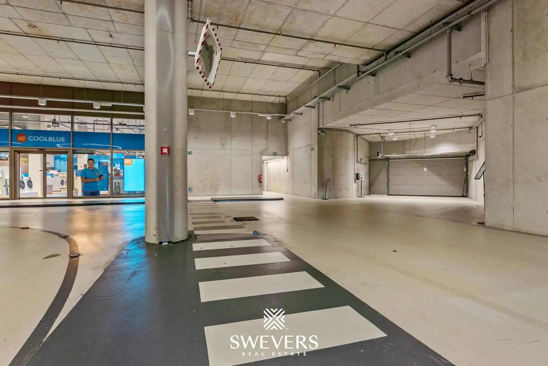 Ruime en beveiligde ondergrondse garagebox te huur in Quartier Blue foto 7