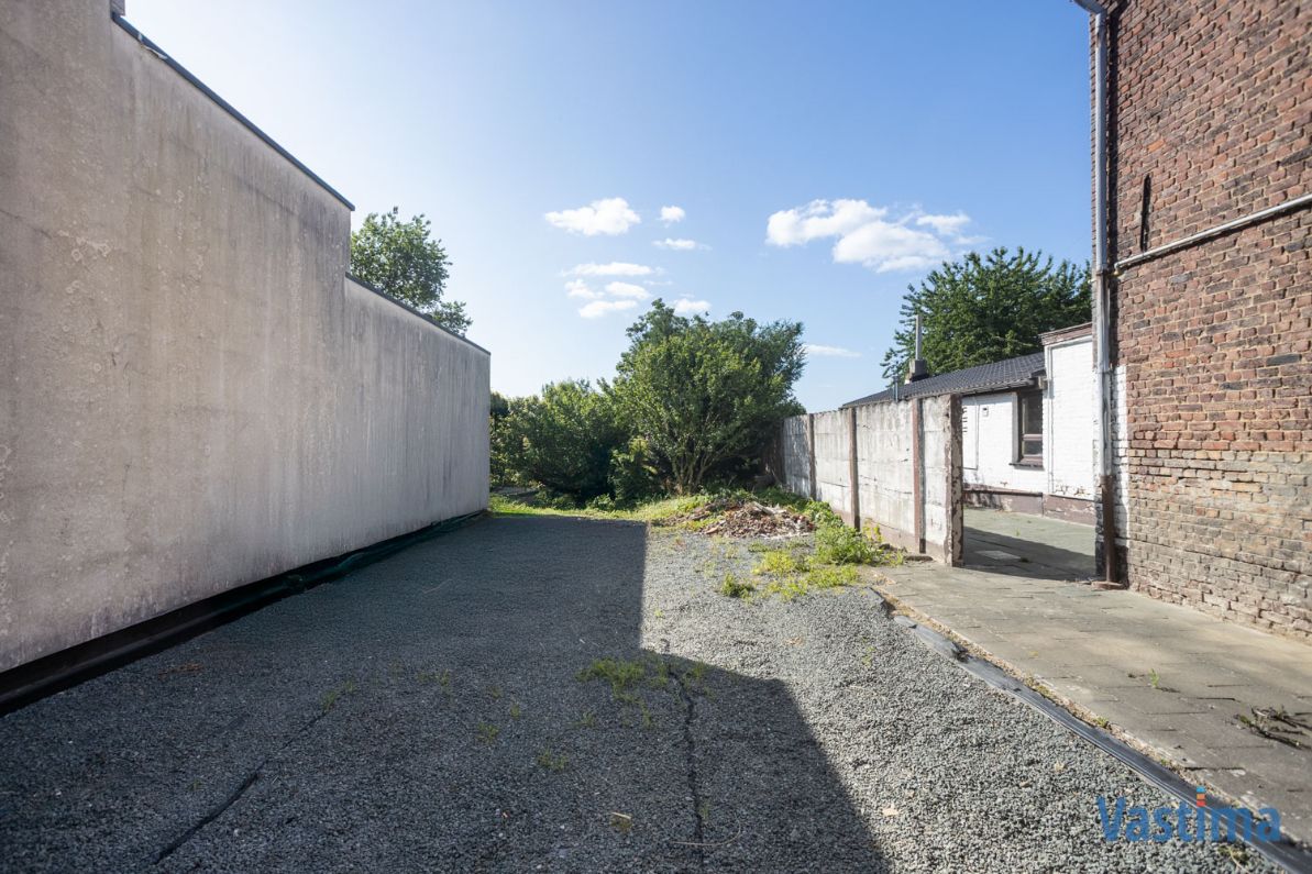 Renovatiewoning met aanpalende bouwgrond nabij centrum Erembodegem foto 29