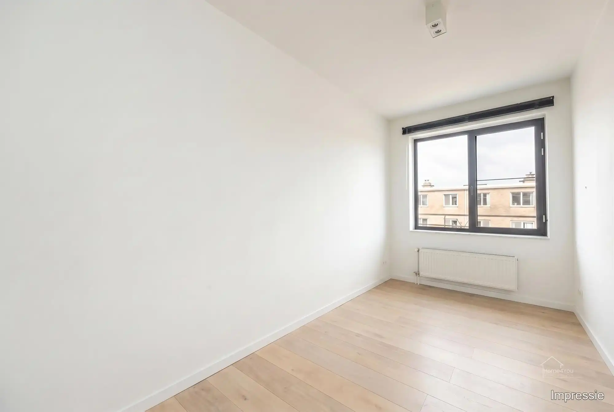 Ruim en lichtrijk appartement met terras + autostaanplaats foto 18