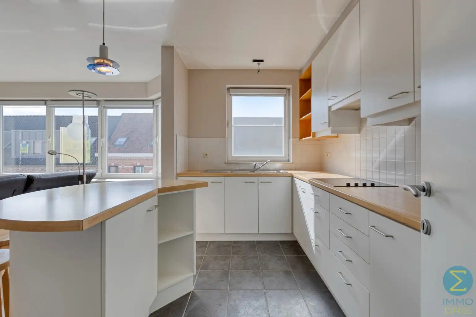 Ruim 2-slaapkamerappartement met balkon, garage én kelder  foto 9