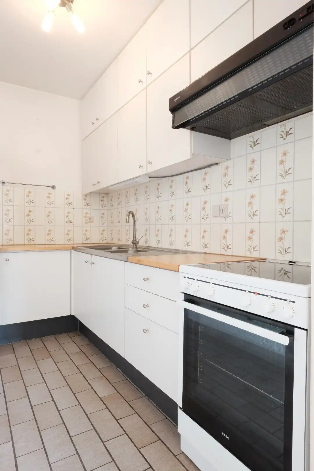 Centraal gelegen gelijkvloers 2-slaapkamerappartement — ideaal als starter of opbrengsteigendom foto 8