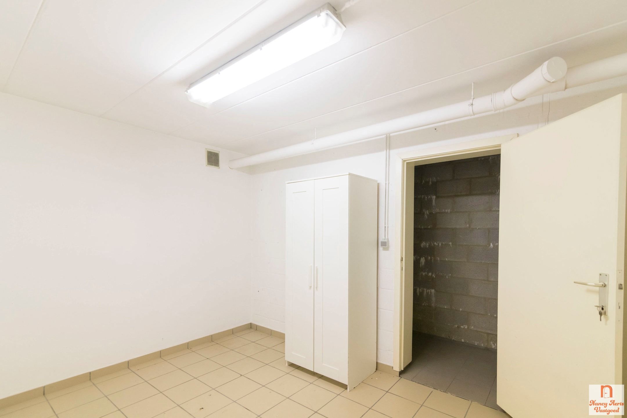 Lichtrijk duplexappartement met grote kelder en mega terras foto 27