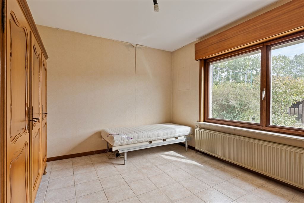 Op te frissen woning te Wilsele!  foto 9