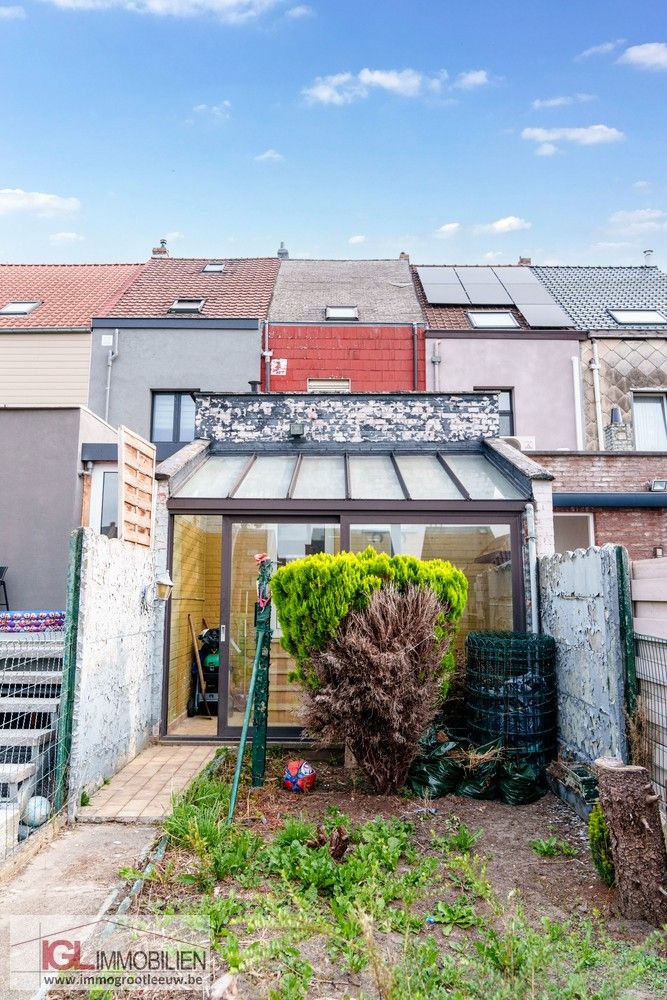 Tweegevel met veel potentieel te koop in Halle foto 20