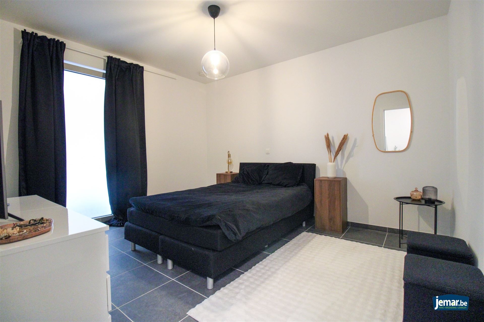 Instapklaar, gelijkvloers en energiezuinig appartement met terras en autostaanplaats in Opgrimbie! foto 8