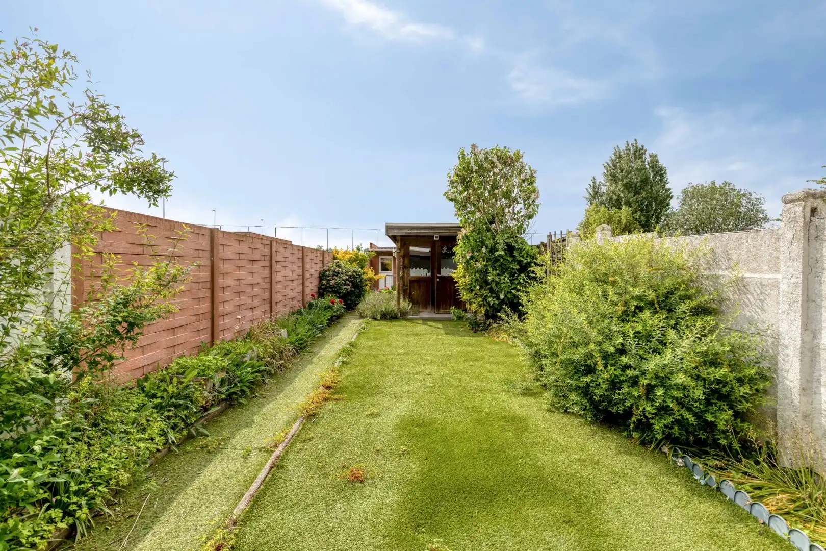 Gezellige rijwoning met grote garage, westgerichte tuin en unieke ligging in Lauwe! foto 17