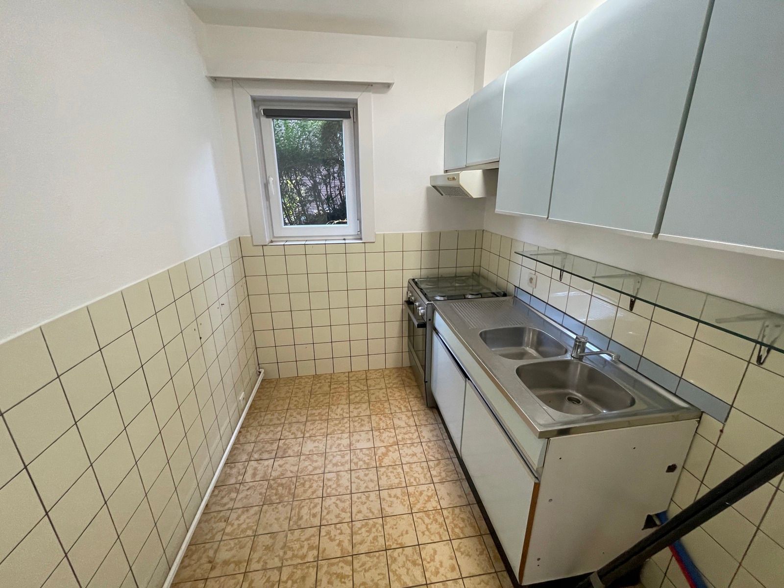 Opbrengsteigendom met 3 appartementen en tuin foto 35