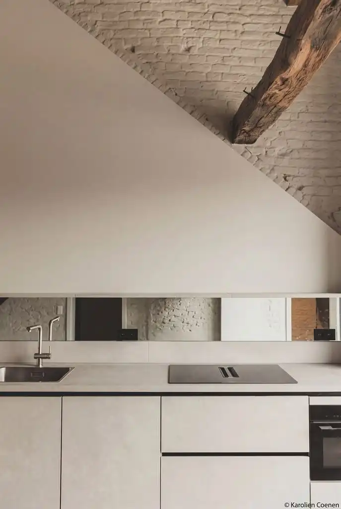 Luxe duplex loft op de tweede verdieping met 2(+1) slaapkamers, ruim terras en optioneel een staanplaats, gelegen in het centrum van Maaseik. foto 3