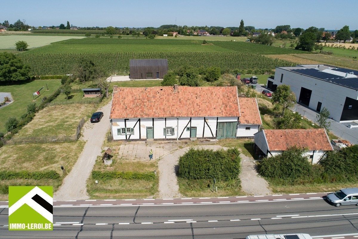 Authentieke te renoveren hoeve + nieuwbouwwoning op een perceel van 39a 26ca! foto 1